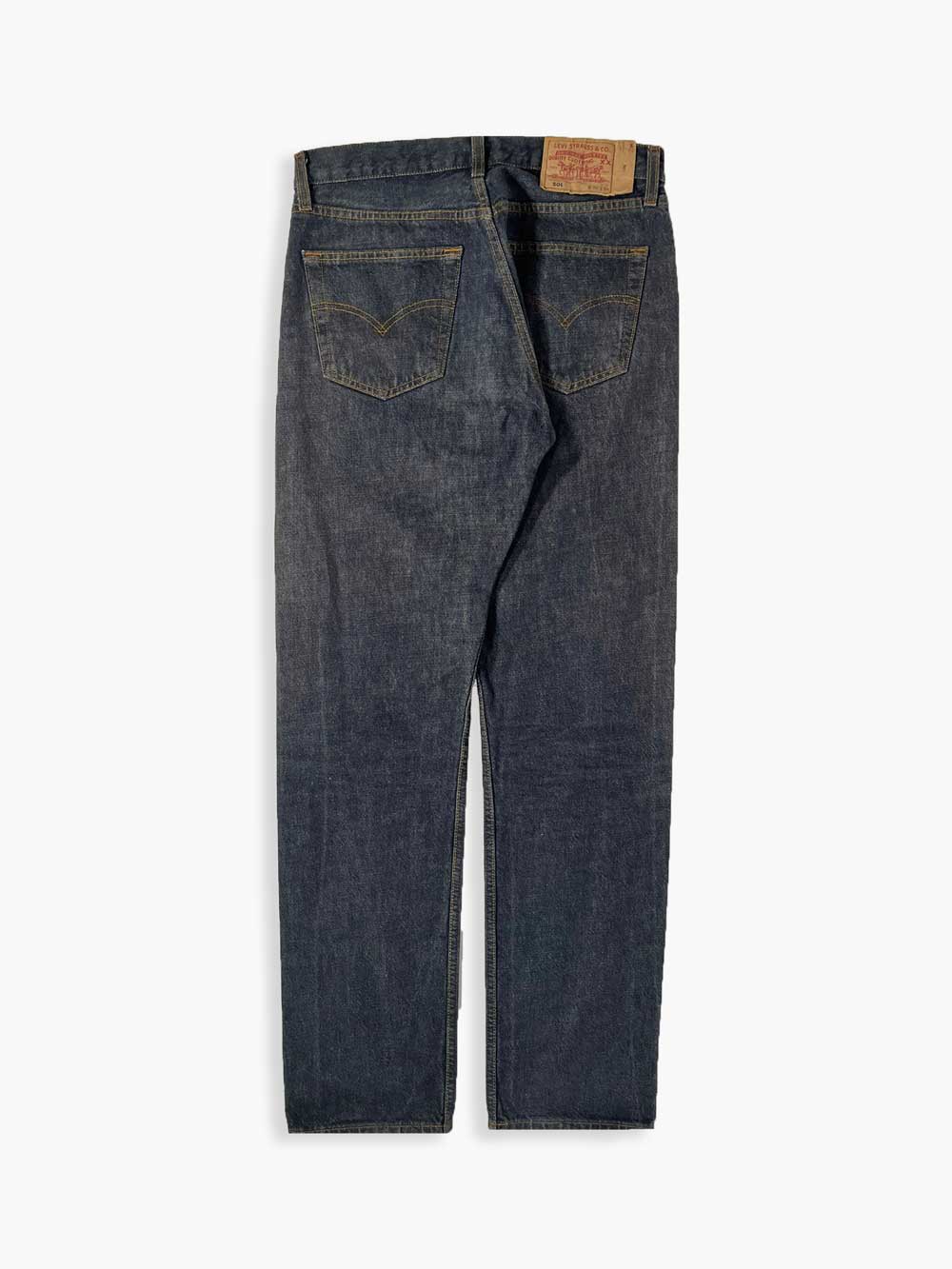 Jeans Levi's 501 vintage 90s raw, Placed on a neutral white background. Levi's vintage 501 raw from 1990s. Step into timeless style with this authentic vintage raw Levi's. Extreme quality fabric with unique color shades.