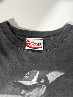 Black godaddy vintage t-shirt featuring Mark Martin, a very successful former racing driver. Considered one of the greatest drivers in NASCAR history. Positioned on a neutral white background.
