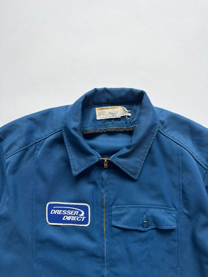 Vintage Work jacket from the 70s “Riverside”. Jacket made in the USA. Zip talon. Front pocket with patch. Boxy fit. Possibility of adding an internal liner.