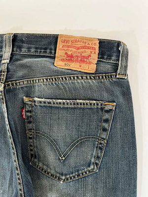 Levi's vintage 501 size 31W 30L. Step into timeless style with this authentic vintage medium blue Levi's. Extreme quality fabric with unique color shades.
