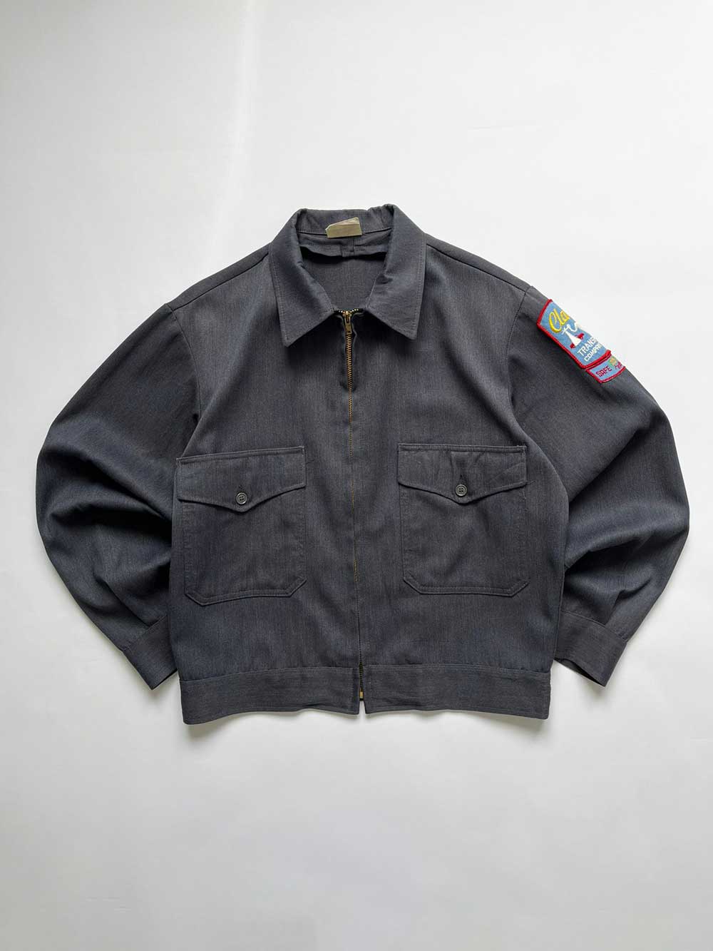 Mr2ply vintage work jacket from the 1960s, used by an American transport company. Made in USA, equipped with talon zip, in gray color and in perfect condition.