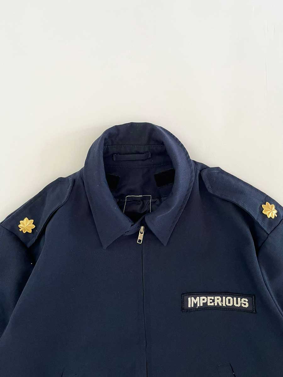Flight Jacket British Army vintage. British Army military bomber jacket with imperious patch. Golden shoulder pads and stars, probably used by a colonel.