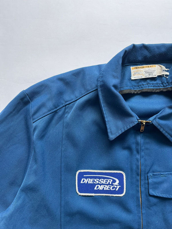 Vintage Work jacket from the 70s “Riverside”. Jacket made in the USA. Zip talon. Front pocket with patch. Boxy fit. Possibility of adding an internal liner.