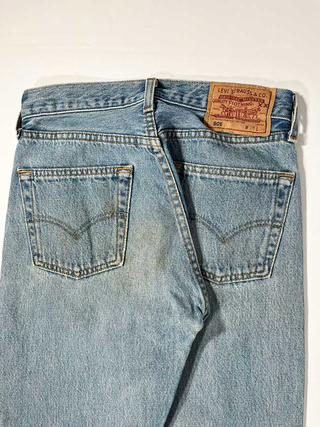Levi's vintage 501 light blue size 28W 30L. Step into timeless style with this authentic vintage light blue Levi's 501 from the 90s, proudly made in UK
