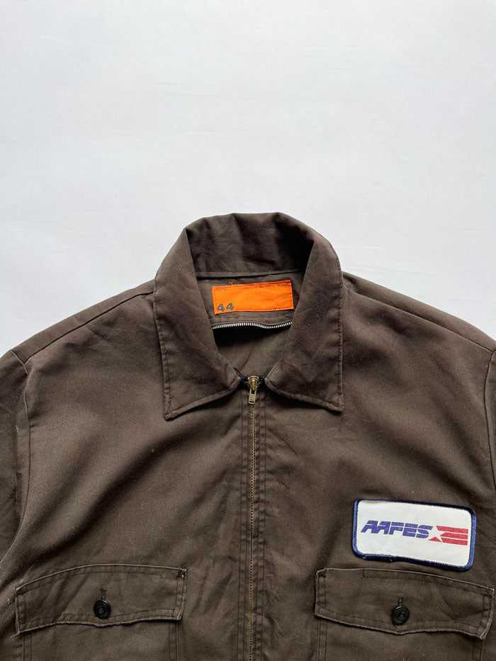 Work jacket vintage from the 70s, permanent press. Made in the USA 70's Talon zip jacket. In excellent condition. Double pocket construction with patch applied on the front.