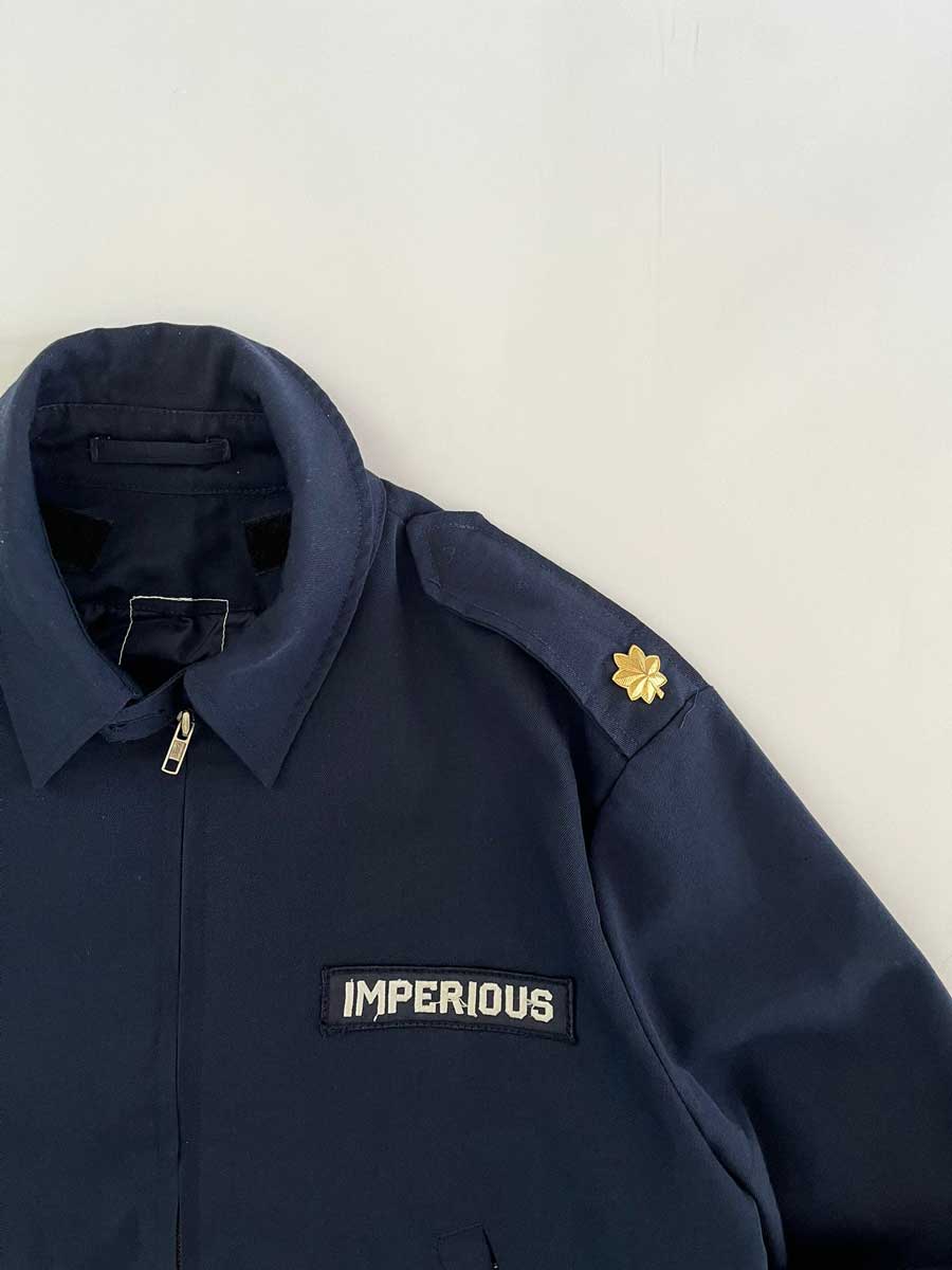 Flight Jacket British Army vintage. British Army military bomber jacket with imperious patch. Golden shoulder pads and stars, probably used by a colonel.