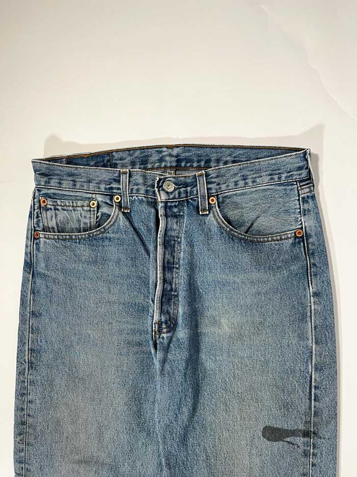 Levi's vintage 501 from 1990s. Step into timeless style with this authentic vintage medium blue Levi's. Extreme quality fabric with unique color shades.