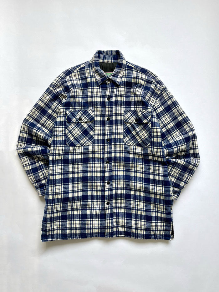 Flannel shirt jacket vintage. Size Large. Quality cotton and perfectly maintained over time. The shirt represents the perfect 90s style. In 100% cotton.