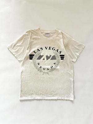90s Las Vegas Nevada single stitch tee. Made in the United States in the 90s. Print on the front with "Nevada" writing. Brand "All Sports Made in Mexico".