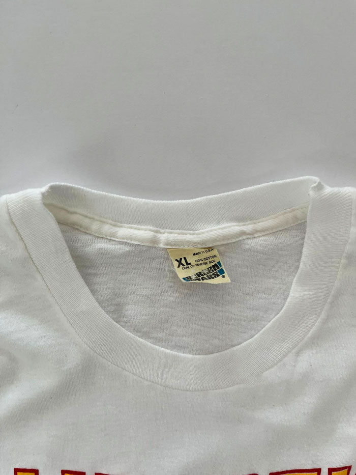 Single stitch tee produced in the United States in the 90s by Screen Stars. Print on the front depicting the New York City Statue of Liberty. Rare tee.
