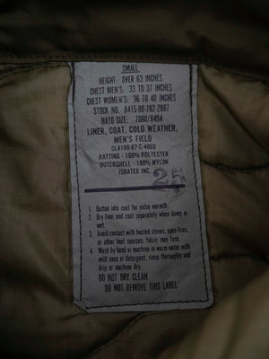 Etichetta originale Isratex Inc. con numero "2.5" scritto a mano