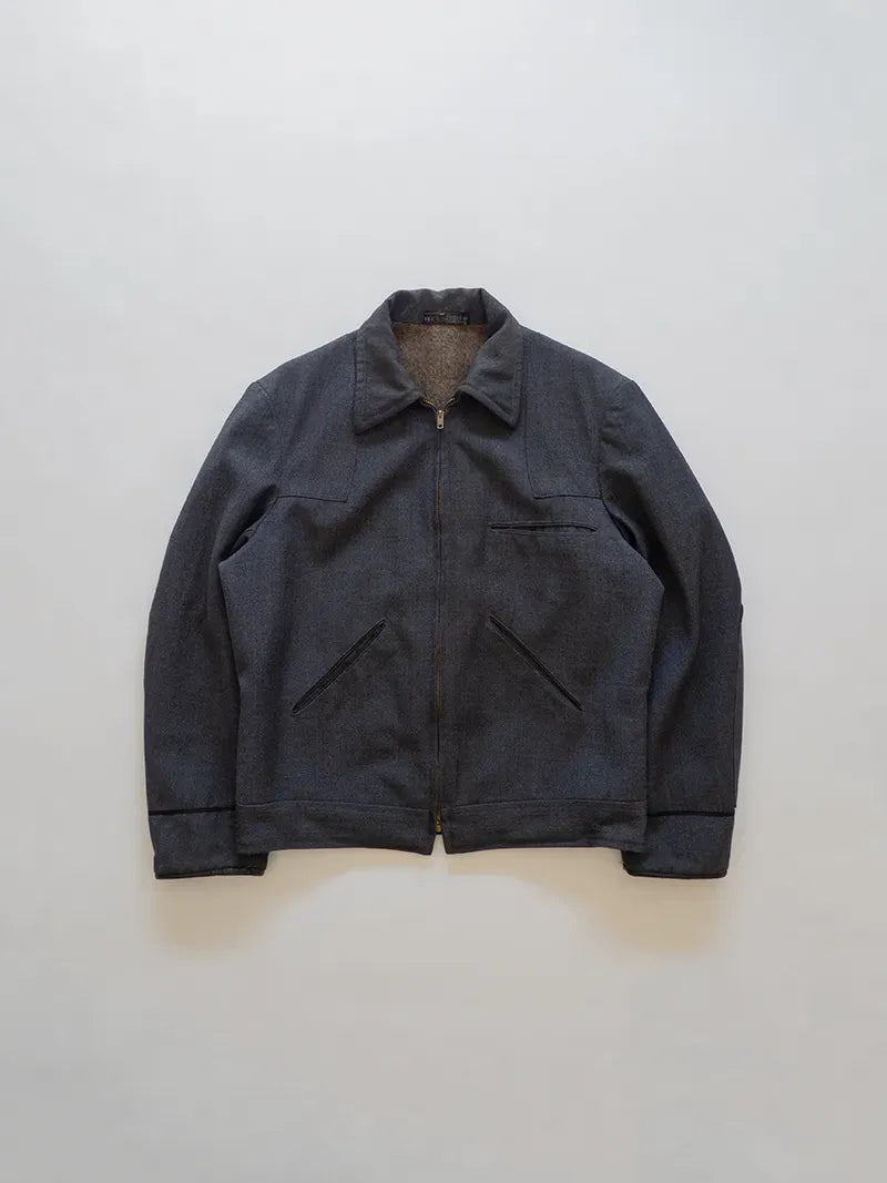 Made in the USA, this mailman's jacket is crafted from whipcord. Talon zip closure. Wool lining. Reinforced leather cuffs. Vintage Whipcord Jacket 40s.