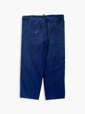 French work pant coming directly from the 1970s. Blue color. Extreme quality fabric. Work trousers are an essential item to have. In herringbone twill.