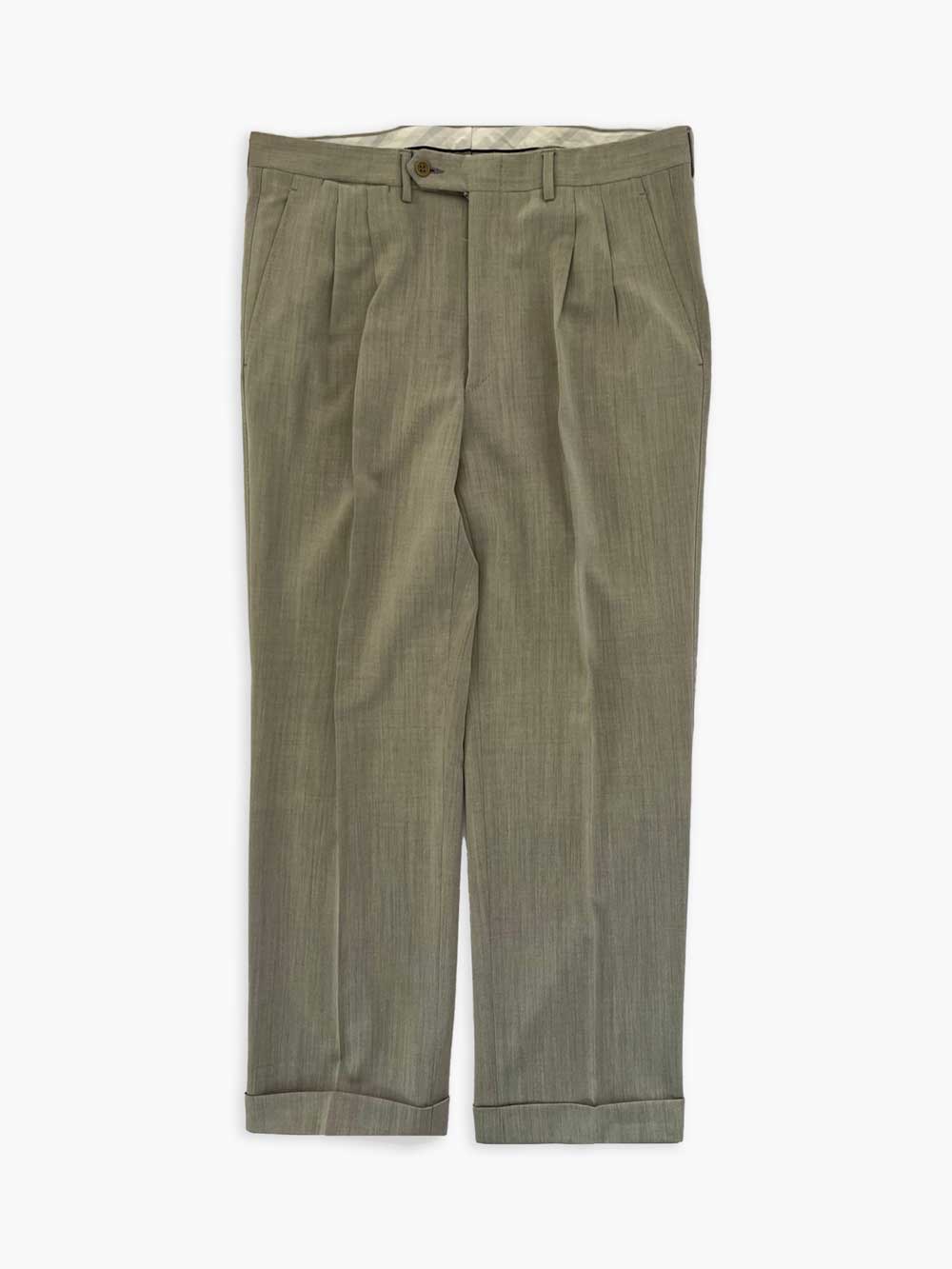 Vintage pleated artisan trousers, Milan channels. Placed on a neutral white background
