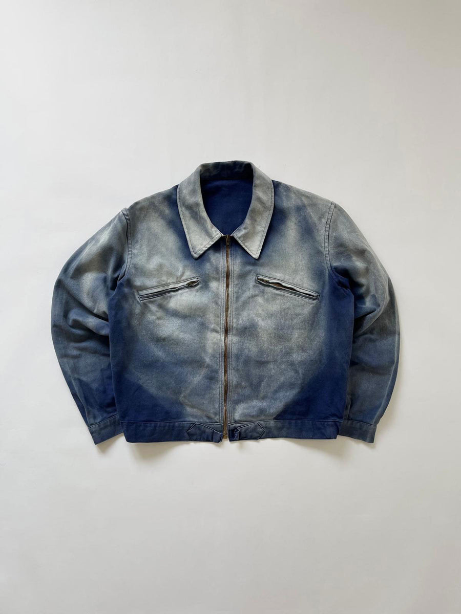 French cyclist jacket from the 50s in classic blue workwear cotton. Unique color nuances and prophete zip. A garment that embodies true French workwear.