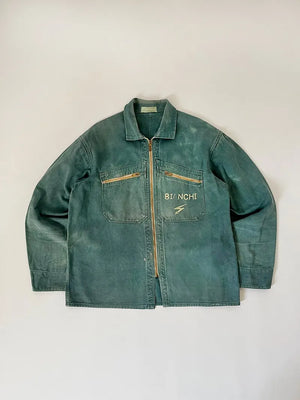 French cyclist jacket La Cigogne dated 60s/70s. Made in classic blue work cotton. The front closure is entrusted to an original ECLAIR zip. Size Large.