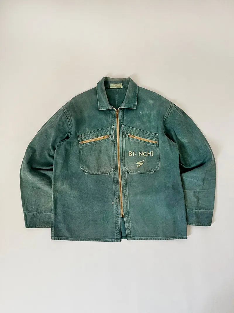 French cyclist jacket La Cigogne dated 60s/70s. Made in classic blue work cotton. The front closure is entrusted to an original ECLAIR zip. Size Large.