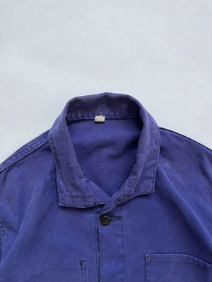 French chore jacket vintage from 80s. Size Medium. Crafted from high-quality, durable cotton. The various shades of blue give this jacket a unique character.