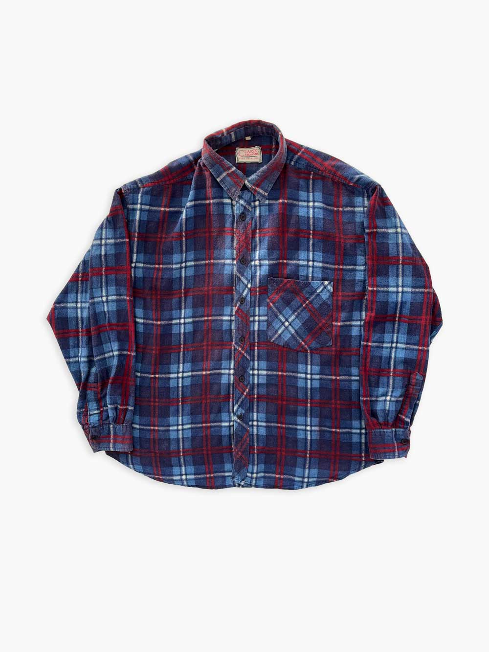Flannel shirt vintage blue. Quality cotton and perfectly maintained over time. The shirt represents the perfect 90s style with its fabric and its colors