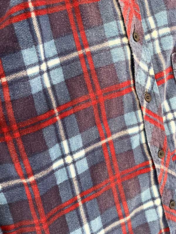 Flannel shirt vintage blue. Quality cotton and perfectly maintained over time. The shirt represents the perfect 90s style with its fabric and its colors