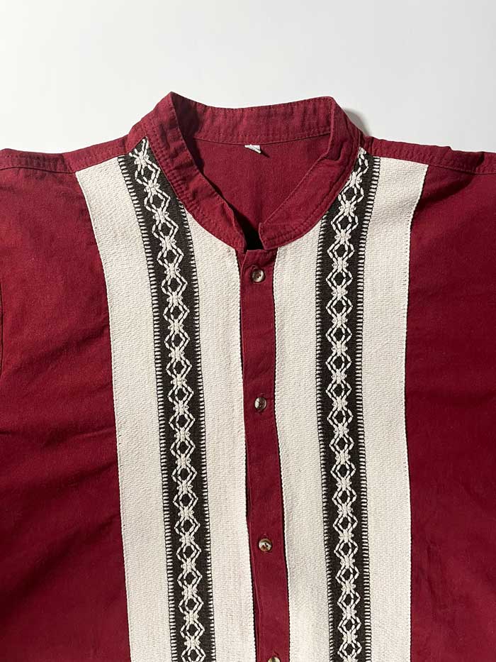Handcrafted burgundy guayabera shirt made in Mexico. Embroidery done down to the smallest details and with extremely high quality fabric. Vintage product. Positioned on a neutral white background