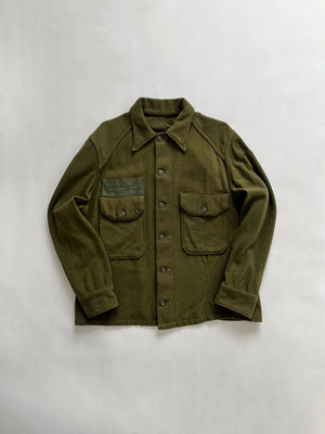 1950-1970s vintage OG-108 wool uniform shirts. Named after “Olive Green 108,” a dark green made for military operations. First pattern. Size Medium.