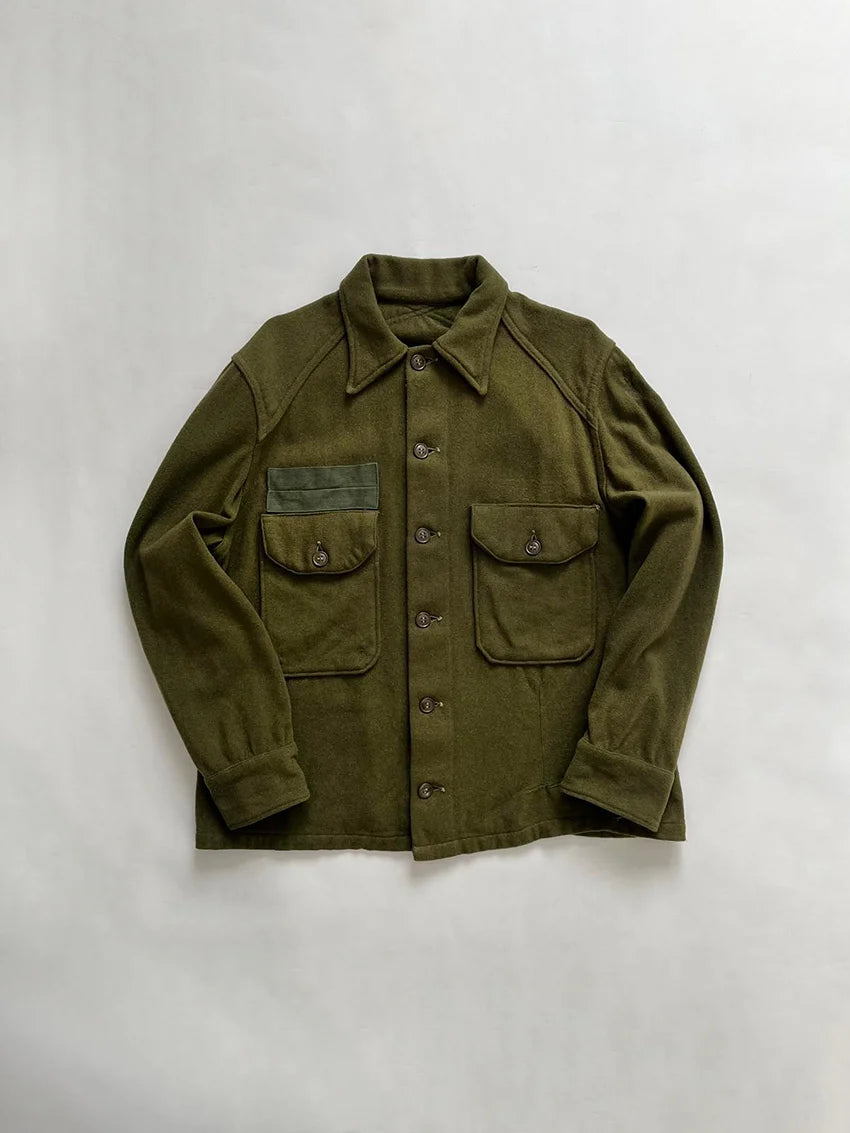 1950-1970s vintage OG-108 wool uniform shirts. Named after “Olive Green 108,” a dark green made for military operations. First pattern. Size Medium.
