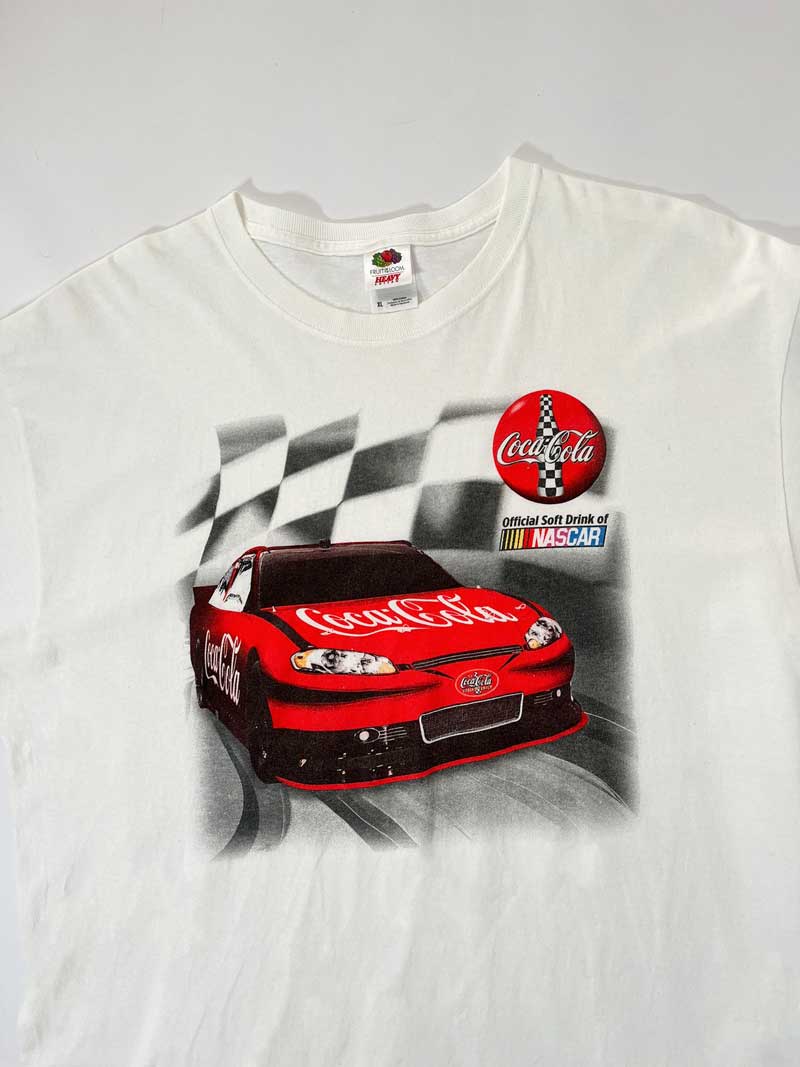 Vintage t-shirt fruit of the loom white by nascar and sponsor coca-cola. Positioned on a neutral white background.