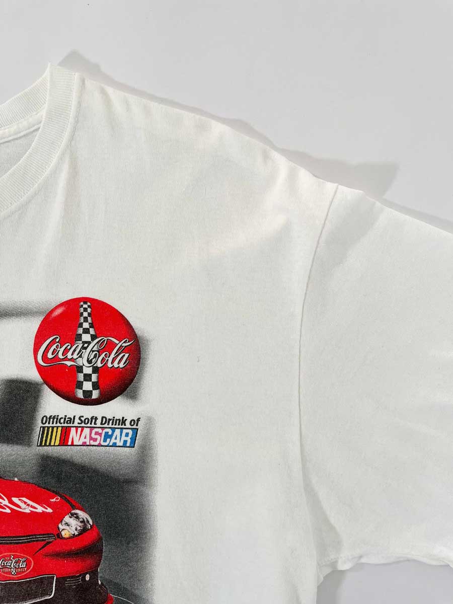 Vintage t-shirt fruit of the loom white by nascar and sponsor coca-cola. Positioned on a neutral white background.