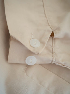 Close-up of the adjustable button cuff on the vintage Dartmouth College Harrington jacket.