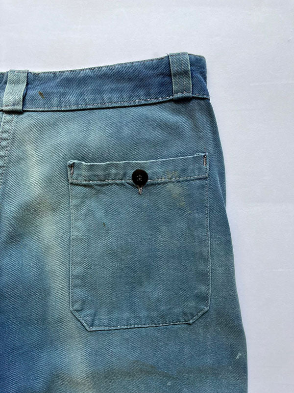 Work pants vintage from 1950s. Color with a fantastic patina given by the passage of time. Vintage work trousers with thick quality fabric. Size 32W 30L.