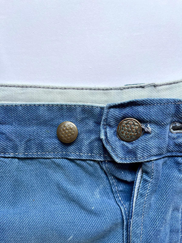 Work pants vintage from 1950s. Color with a fantastic patina given by the passage of time. Vintage work trousers with thick quality fabric. Size 32W 30L.