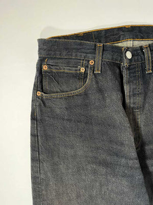 Jeans Levi's 501 vintage 90s raw, Placed on a neutral white background.  Levi's vintage 501  raw from 1990s. Step into timeless style with this authentic vintage raw Levi's. Extreme quality fabric with unique color shades.