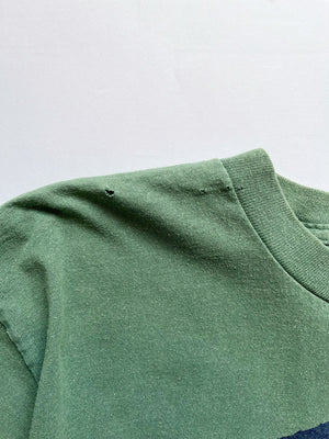 "God bless the whole world" single stitch t shirt vintage 90s. Made USA. Hanes brand. Print on the front with quote. Tee with green quality cotton. Size Large. 