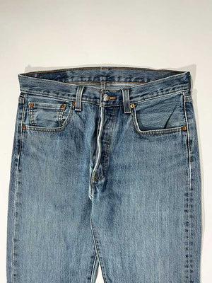 Levi's vintage 501 size 30W 32L. Step into timeless style with this authentic vintage medium blue Levi's. Extreme quality fabric with unique color shades.
