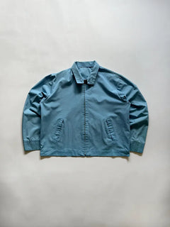 Vintage light jacket dated approximately 1970s. Cotton blend. Made in USA. in excellent condition. Size medium/large. Zip Venus.
