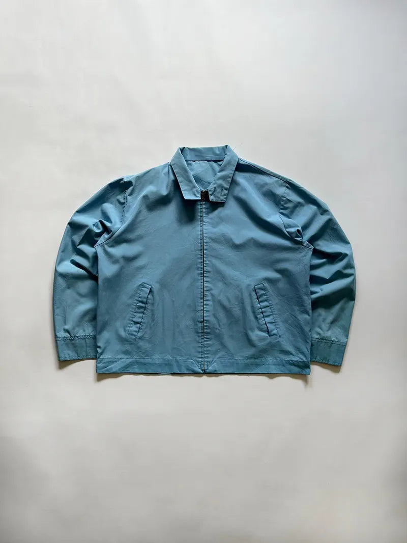 Vintage light jacket dated approximately 1970s. Cotton blend. Made in USA. in excellent condition. Size medium/large. Zip Venus.