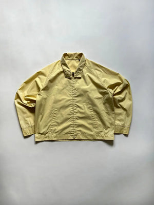 Vintage yellow Light Jacket dated approximately 80s. Cotton blend. Made in USA. in excellent condition. Size large. 