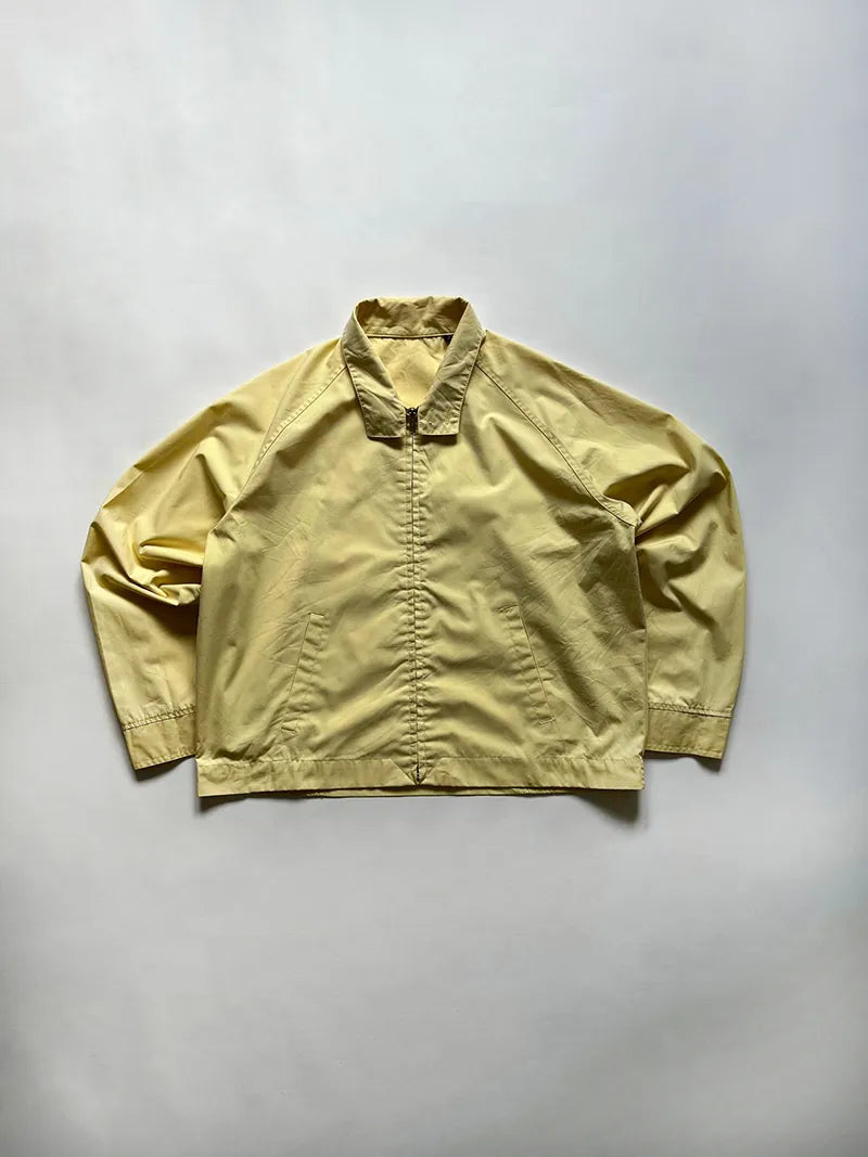 Vintage yellow Light Jacket dated approximately 80s. Cotton blend. Made in USA. in excellent condition. Size large. 