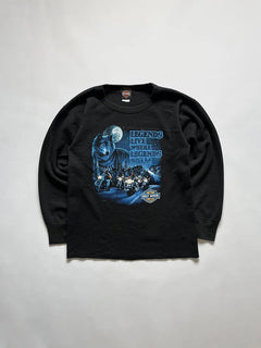Vintage 90s Harley Davidson long sleeve tee model with "Legends Live Where Legends Roam" graphic. The front features a suggestive night scene. Made in USA.