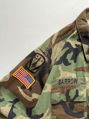 US Army jacket combat coat Vintage. Size M short. US Army Warm Weather Woodland Camouflage Pattern Combat Coat, made of a tough and durable ripstop fabric. 