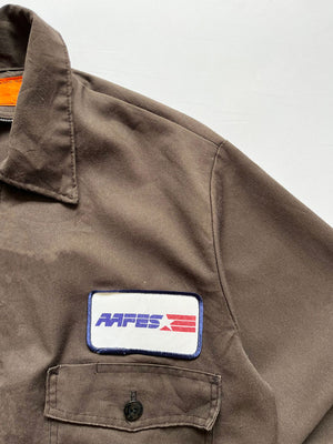 Work jacket from the 70s, permanent press. Made in the USA 70's Talon zip jacket. In excellent condition. Double pocket construction with patch applied on the front. 
