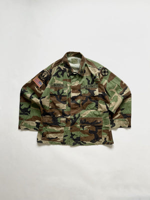 US Army jacket combat coat Vintage. Size M short. US Army Warm Weather Woodland Camouflage Pattern Combat Coat, made of a tough and durable ripstop fabric. 