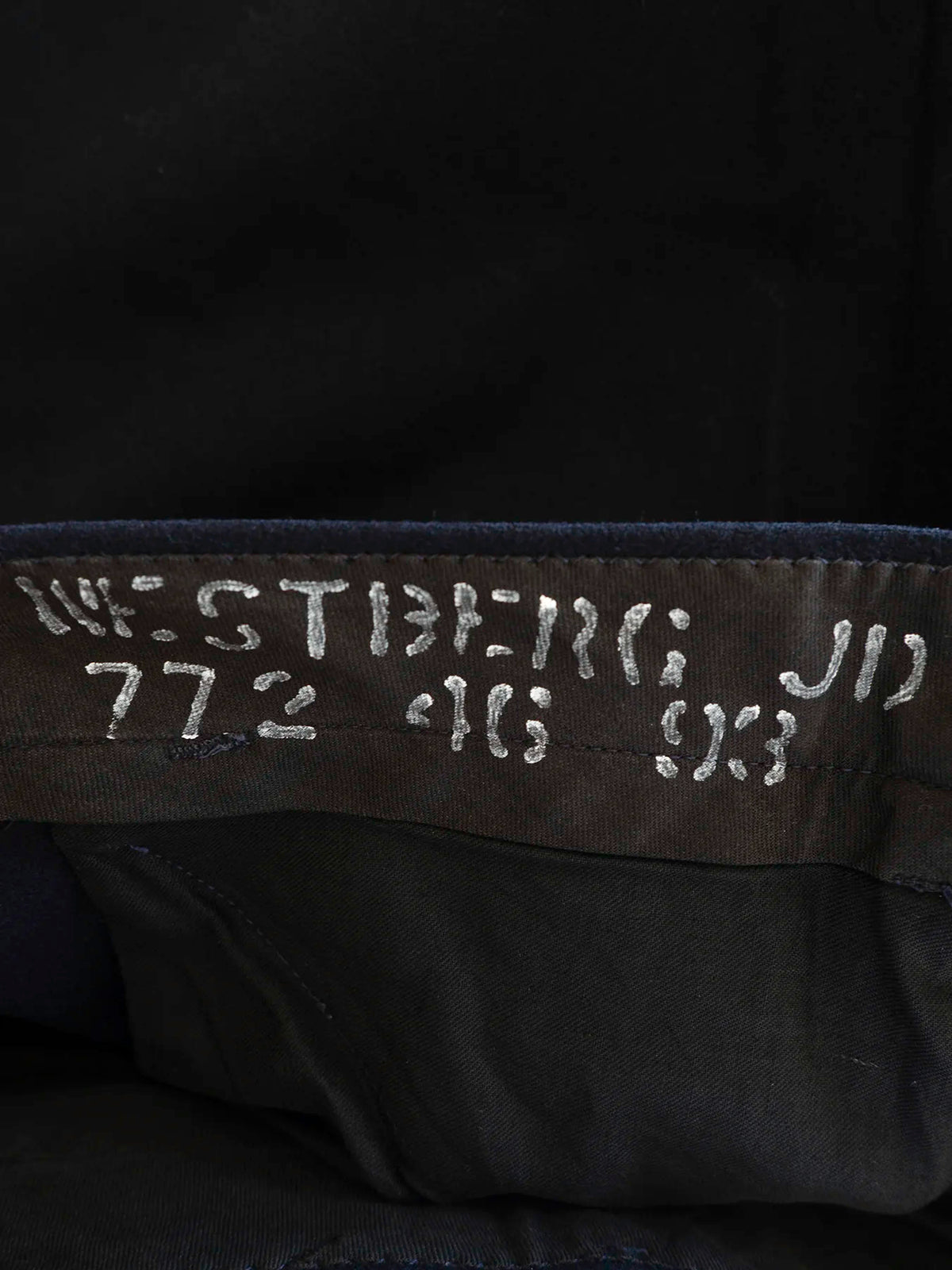 Nome del marinaio "Westberg" stampigliato all'interno della vita