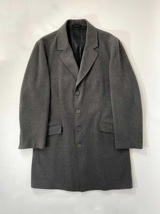 Elegant handcrafted vintage overcoat expertly made in Italy using traditional techniques and high quality materials. Color Melange Gray. Produced in 1990. 