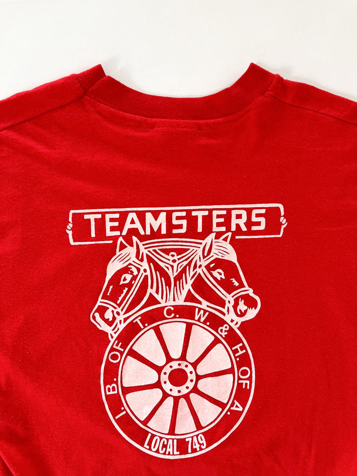 T shirt vintage single stitch Teamsters red produced in the United States in the 1980s. Teamsters is a truckers union in the United States. Rare vintage piece