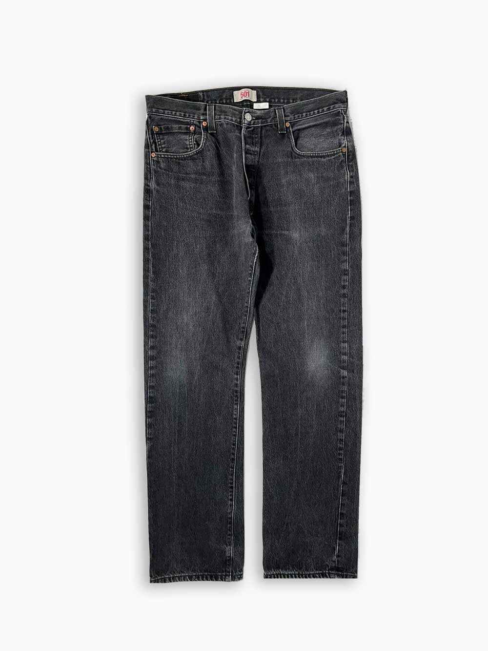 Levi's vintage 501 faded black. Step into timeless style with this authentic vintage faded black Levi's 501, with unique color shades. Quality denim cotton.