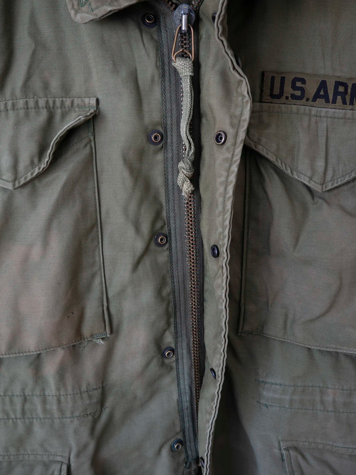 Colletto con vano portacappuccio della giacca M65 US Army