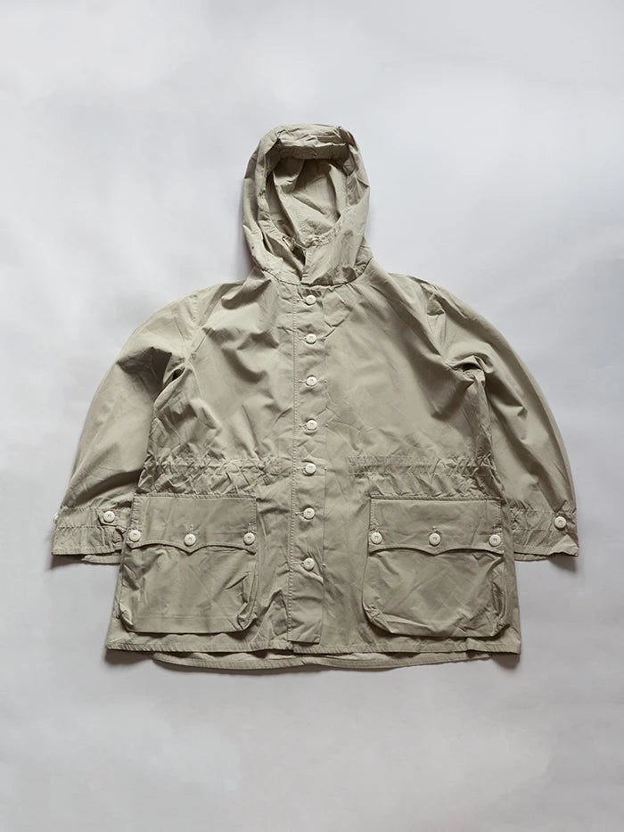 Vintage 1970s Swedish Army M62 snow parka, also known as the Snojacka or Snoblus. The front has a button closure and large flap pockets on both sides.