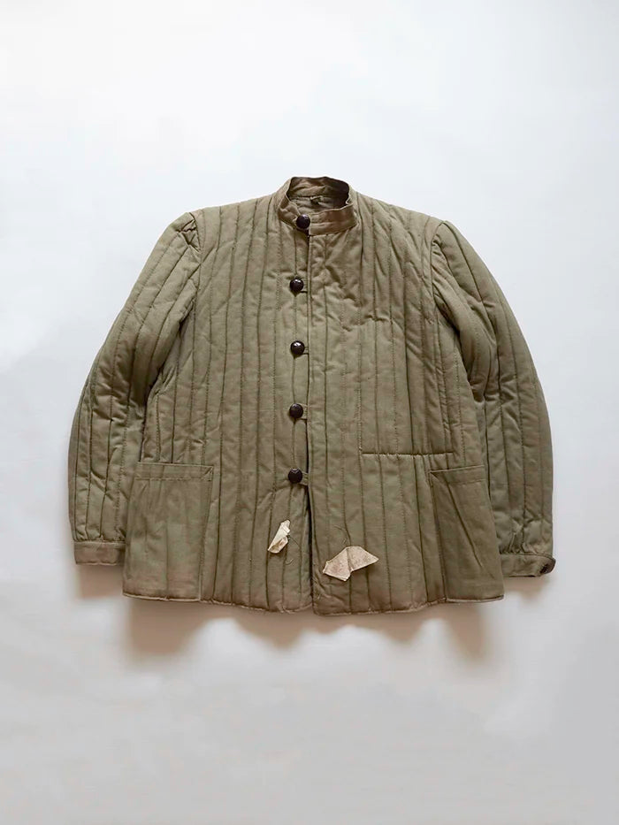50s Bulgarian Army *telogreika*. These jackets featured a lightweight, compact design, providing excellent warmth while ensuring mobility and protection.
